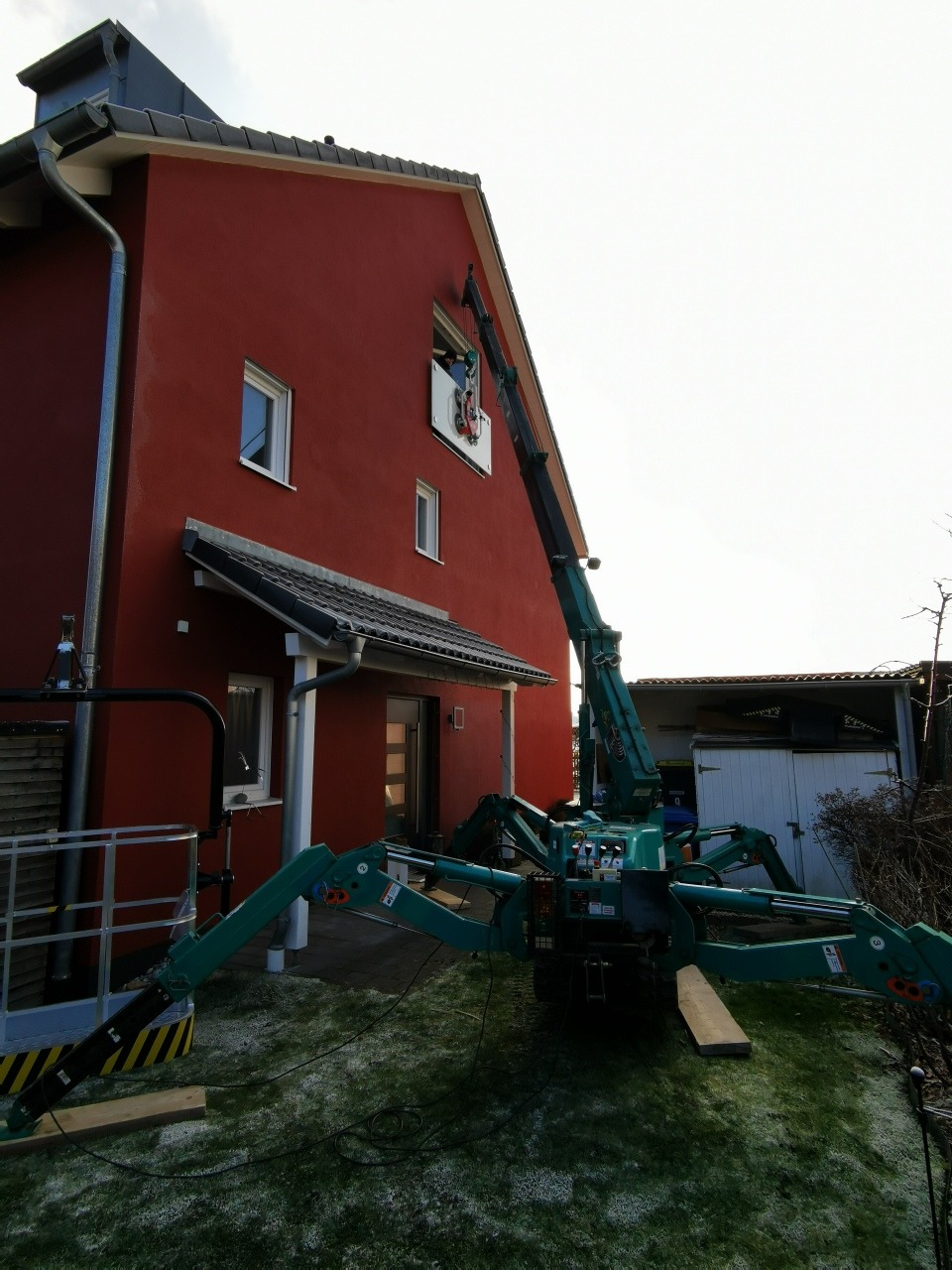 Glassauger bei Verglasungsarbeiten