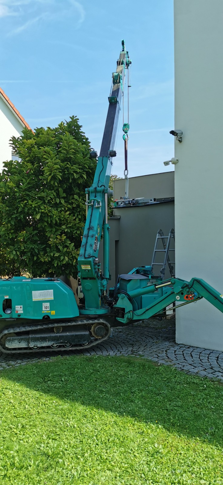 Spinnenkran bei Hausmontage